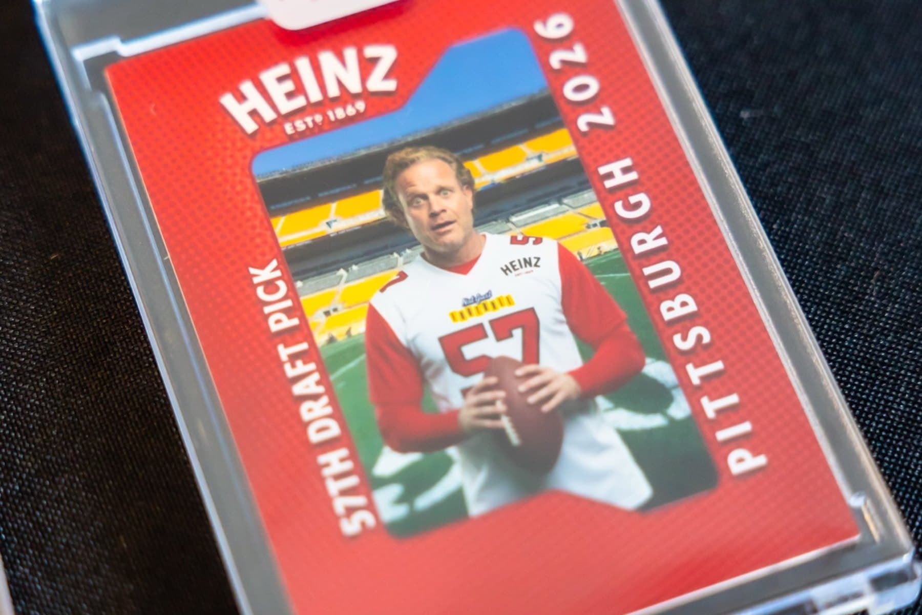 A guest's custom AI trading card, printed and sealed in a premium hard case, produced live at an NFL Draft brand activation.