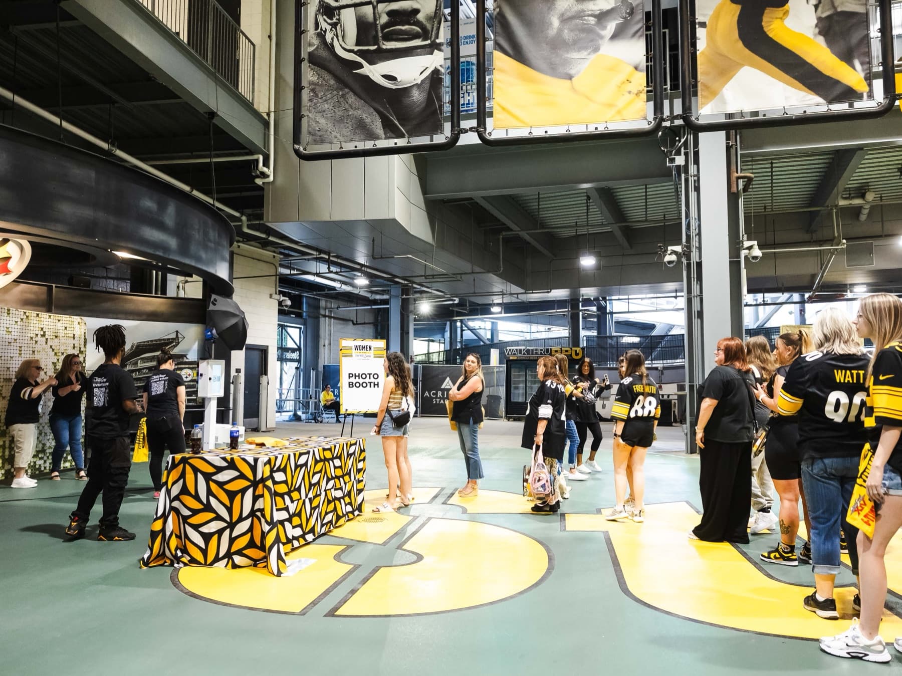 The activation floor at the Great Hall — branded capture stations with fans queued.